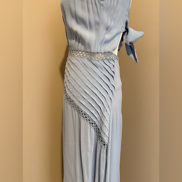 Reiss stunning blue dress size 4 never worn
Open back with tie - Picture 8 of 16